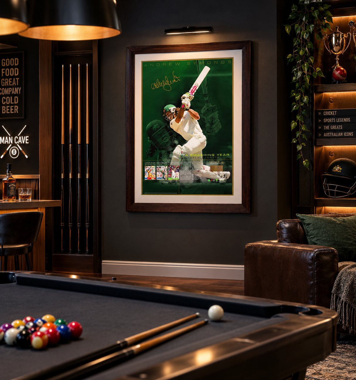 The framed Symonds piece hanging on the wall of a dark games room with pool table and trophy shelf